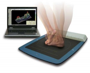 Foot pressure-sensing mat connected to laptop